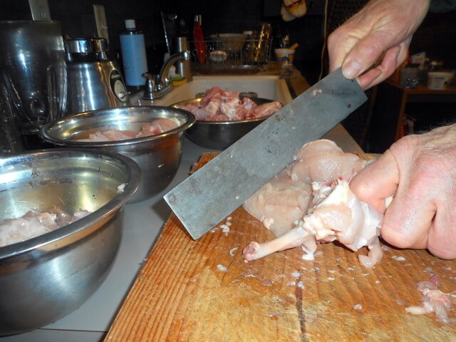 I'm chopping up a whole chicken and will feed it with vegetables for my dog.