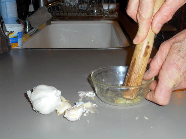 Make sure you mash your garlic dog flea remedy