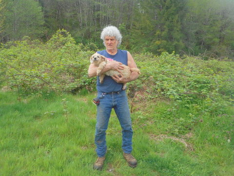 My brother is holding Nimble in her dog flea patch!
