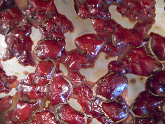 Chicken liver doggy appetizers are ready to be flipped over, then back in the oven!
